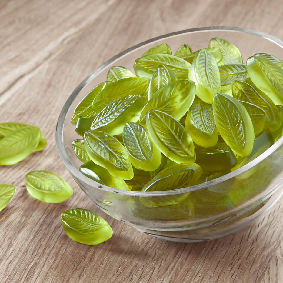 Waldmeister Fruchtgummi Waldmeister-Blätter mit 10 % Fruchtsaftfruchtgummi Waldmeister Fruchtgummi Waldmeister-Blätter mit 10 % Fruchtsaftfruchtgummi